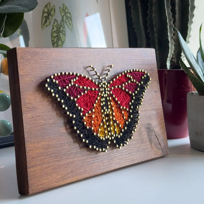 Butterfly string art pattern with printable design and instructions.