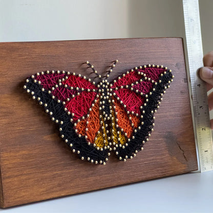 Butterfly string art pattern with printable design and instructions.