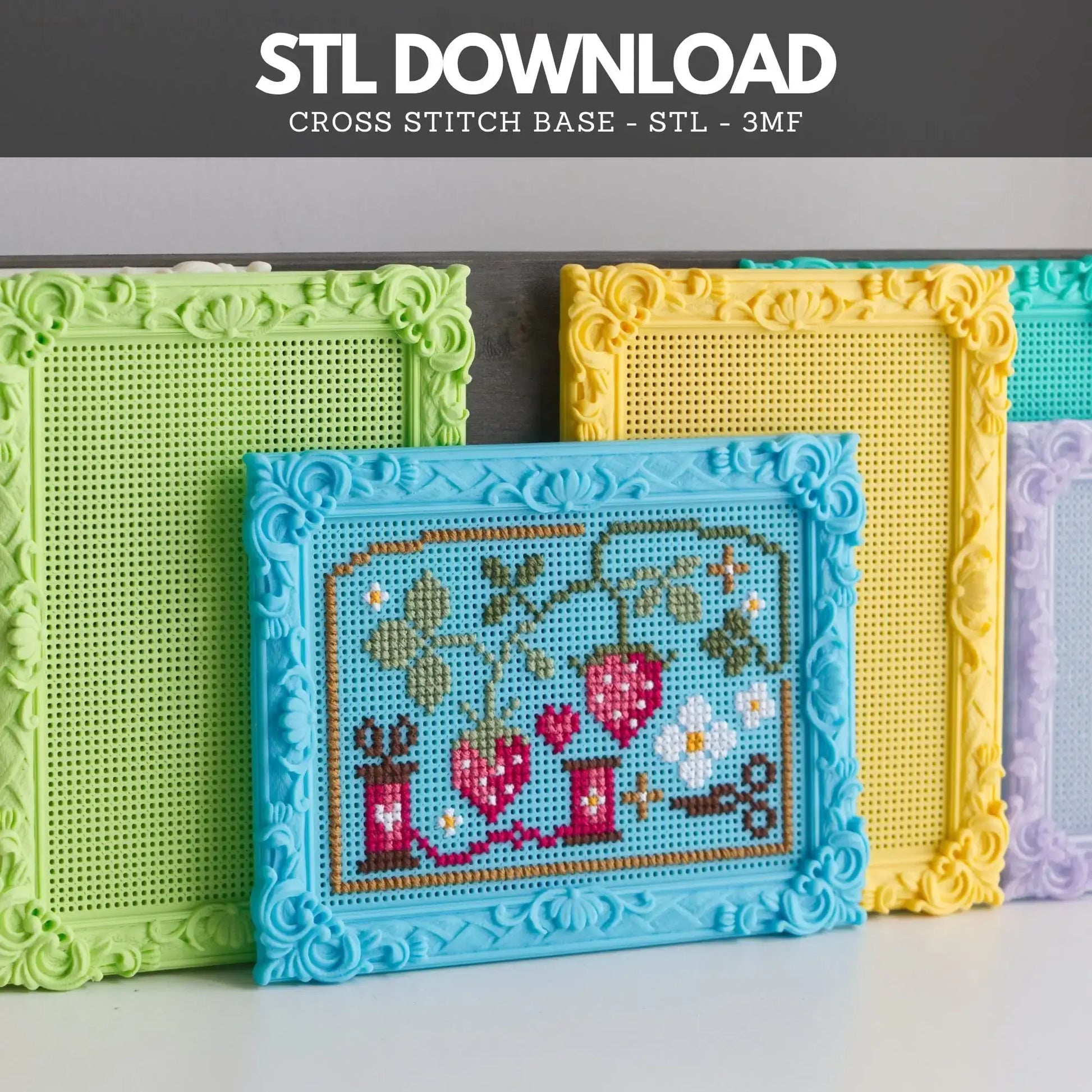 Colorful 3D-printed rectangular cross stitch frames displayed together, with a blue frame in front stitched with strawberries, flowers and sewing motifs. Text above reads “STL Download” and “Cross Stitch Base - STL - 3MF.”