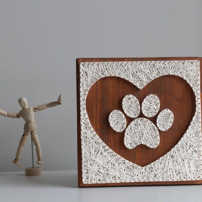 front view of string art paw