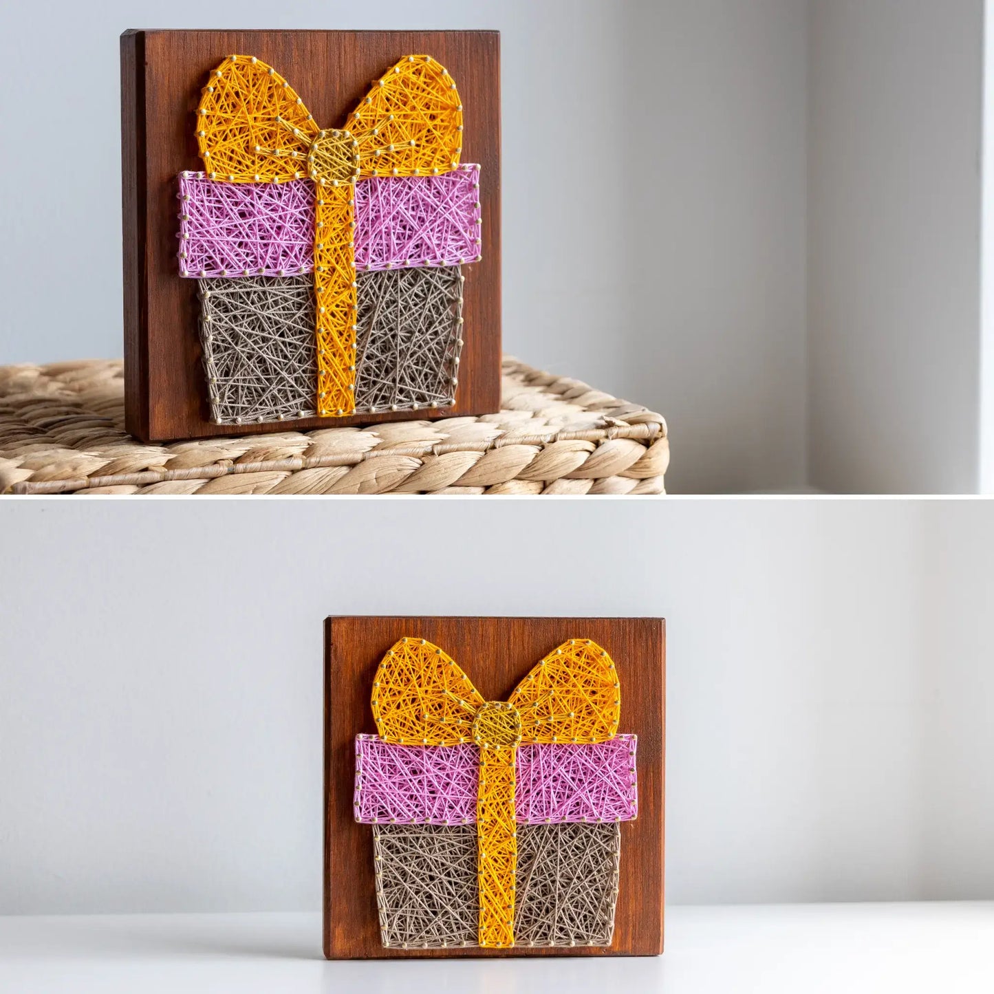 String art of a gift box with a bow on a wooden board, displayed against a neutral background.