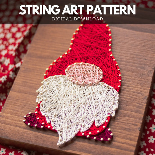 Festive gnome string art featuring a red hat and white beard, displayed on a wooden background as a DIY digital download project.