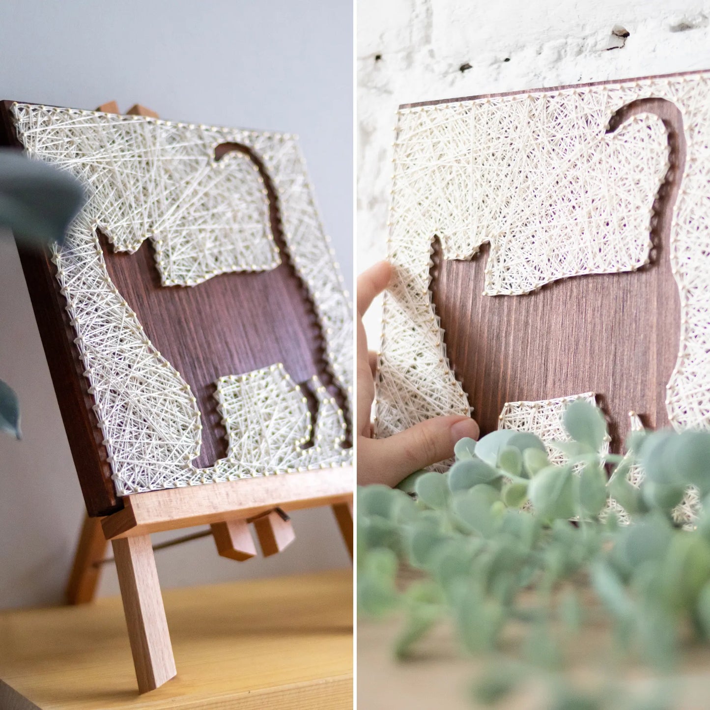 A close-up view of a DIY cat string art sign, featuring intricate white string patterns on a dark wooden background.