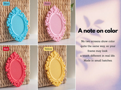 Ornate oval cross stitch frames in blue, pink, red, and yellow, shown against a woven background with the stitchable grid visible, beside a note about color varying between screens.