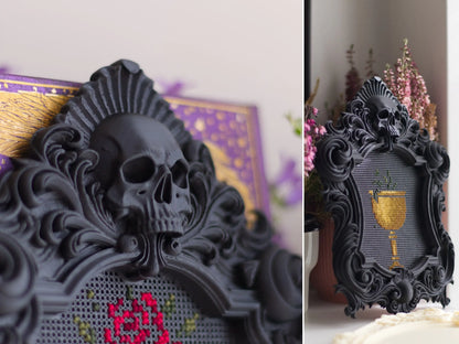 Two views of a black gothic skull cross stitch frame: a close-up of the skull above the first stitched rose, and the whole frame with only the gold chalice stitched so far.