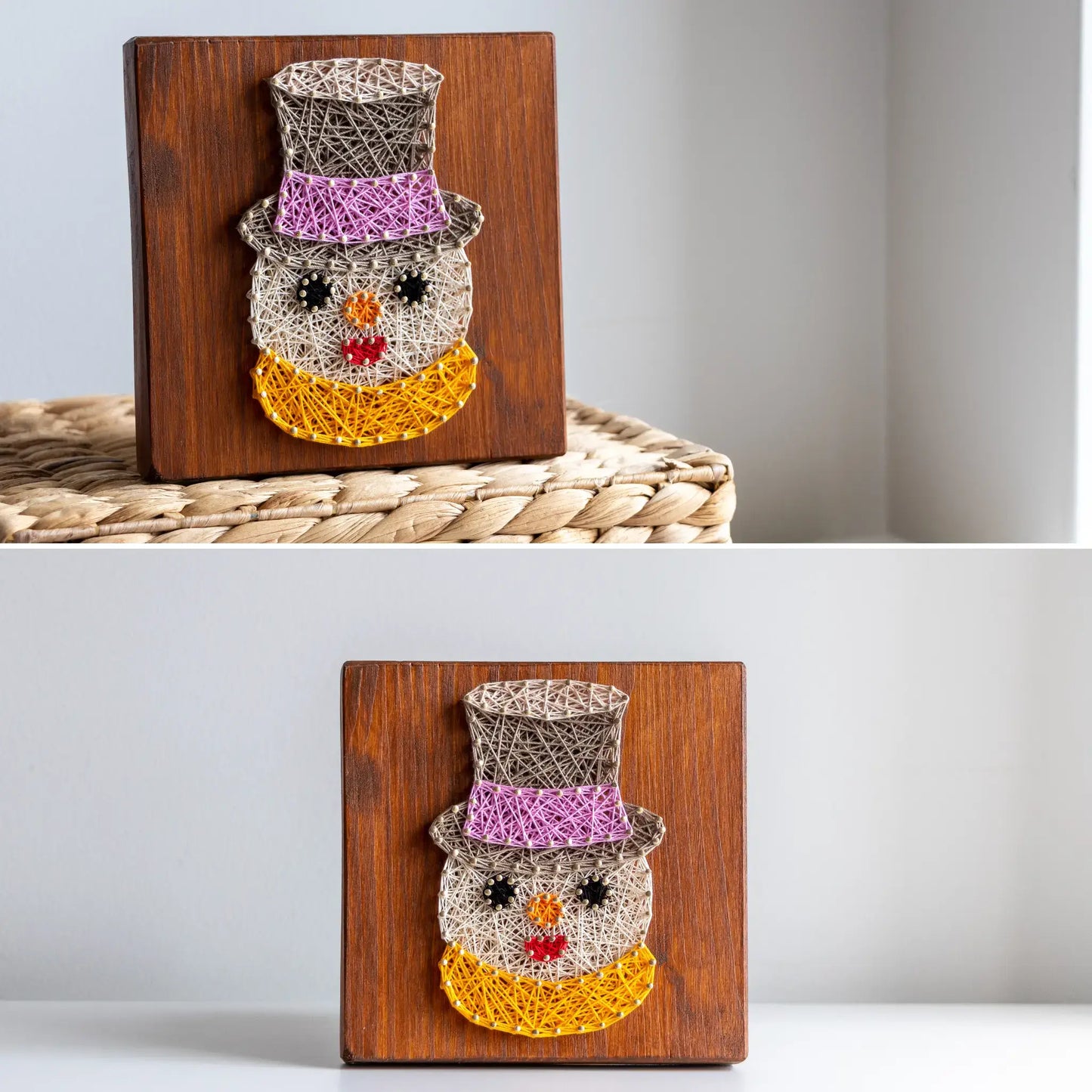 String art of a snowman on a wooden block against a neutral background
