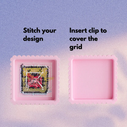 Mini embroidery box lids showing completed cross stitch design and removable clip for hiding thread ends