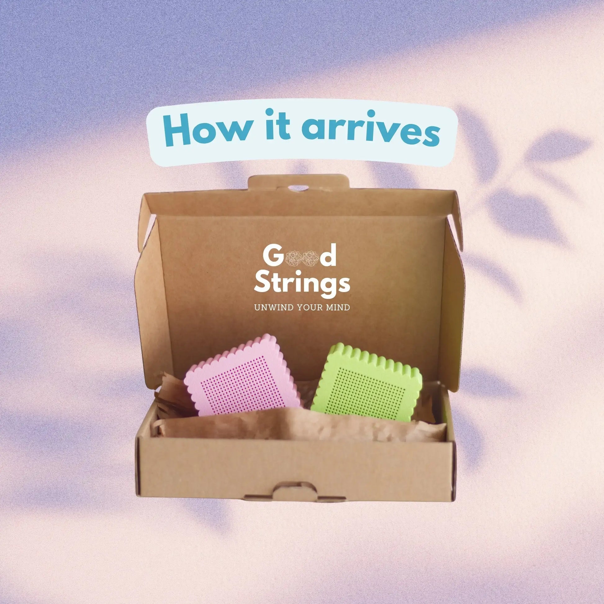 Set of 2 mini cross stitch boxes in pink and green packed in branded box showing how they arrive