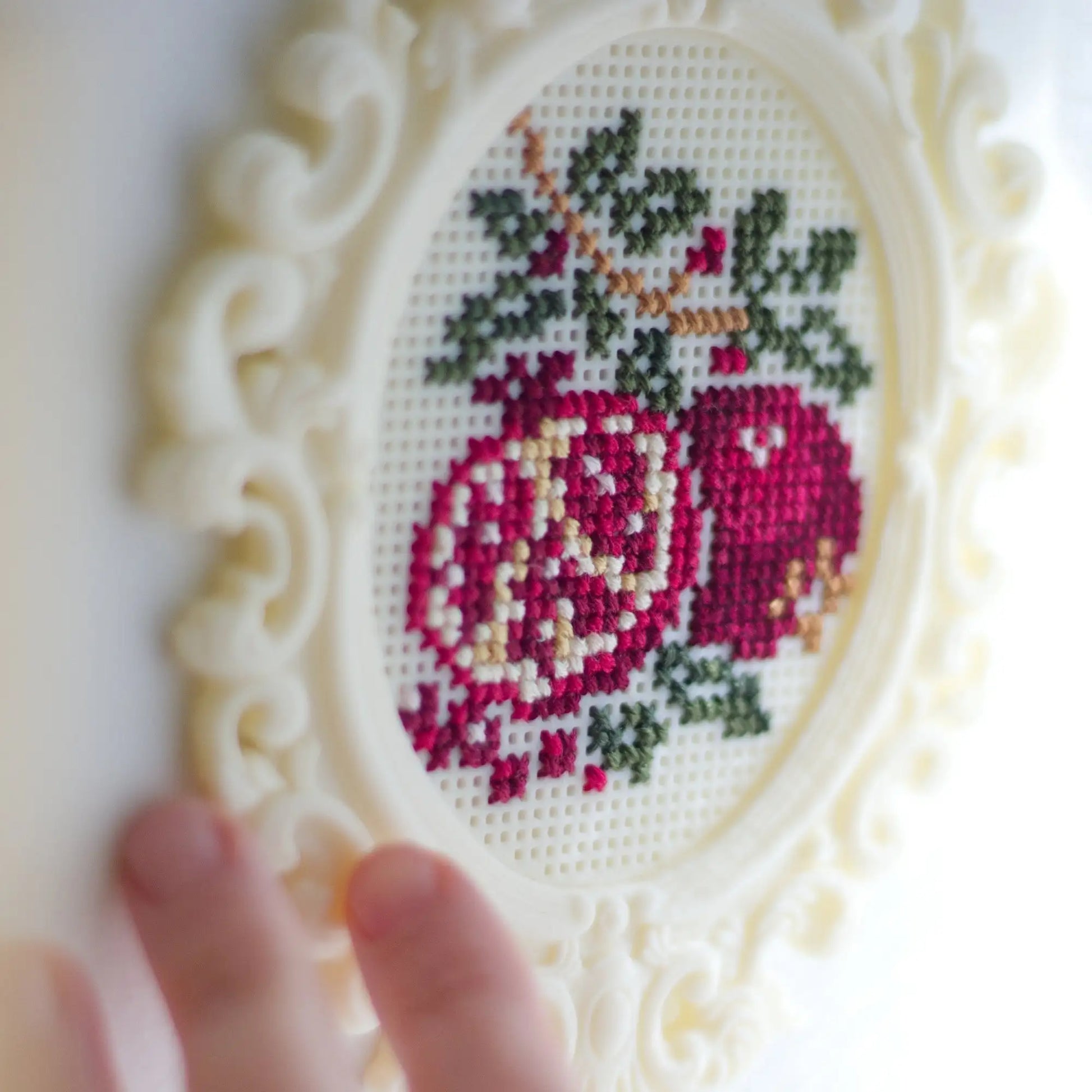 Baroque oval cross stitch frame with pomegranate embroidery design and ornate decorative border