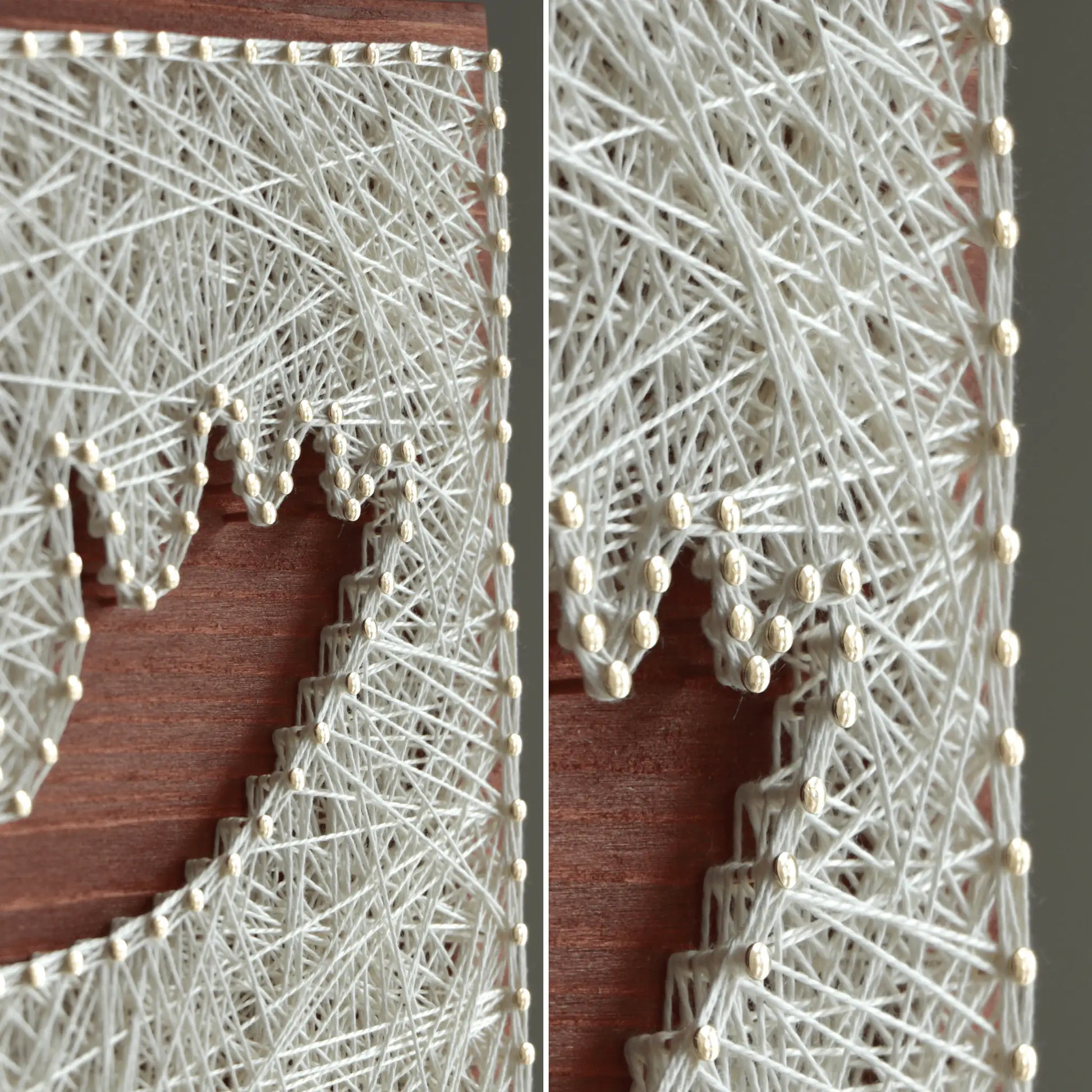 Close-up detail of the moose silhouette string art showing ivory thread wrapped around decorative nails on a stained wooden base, highlighting the layered stringing and nail placement of a DIY string art kit.